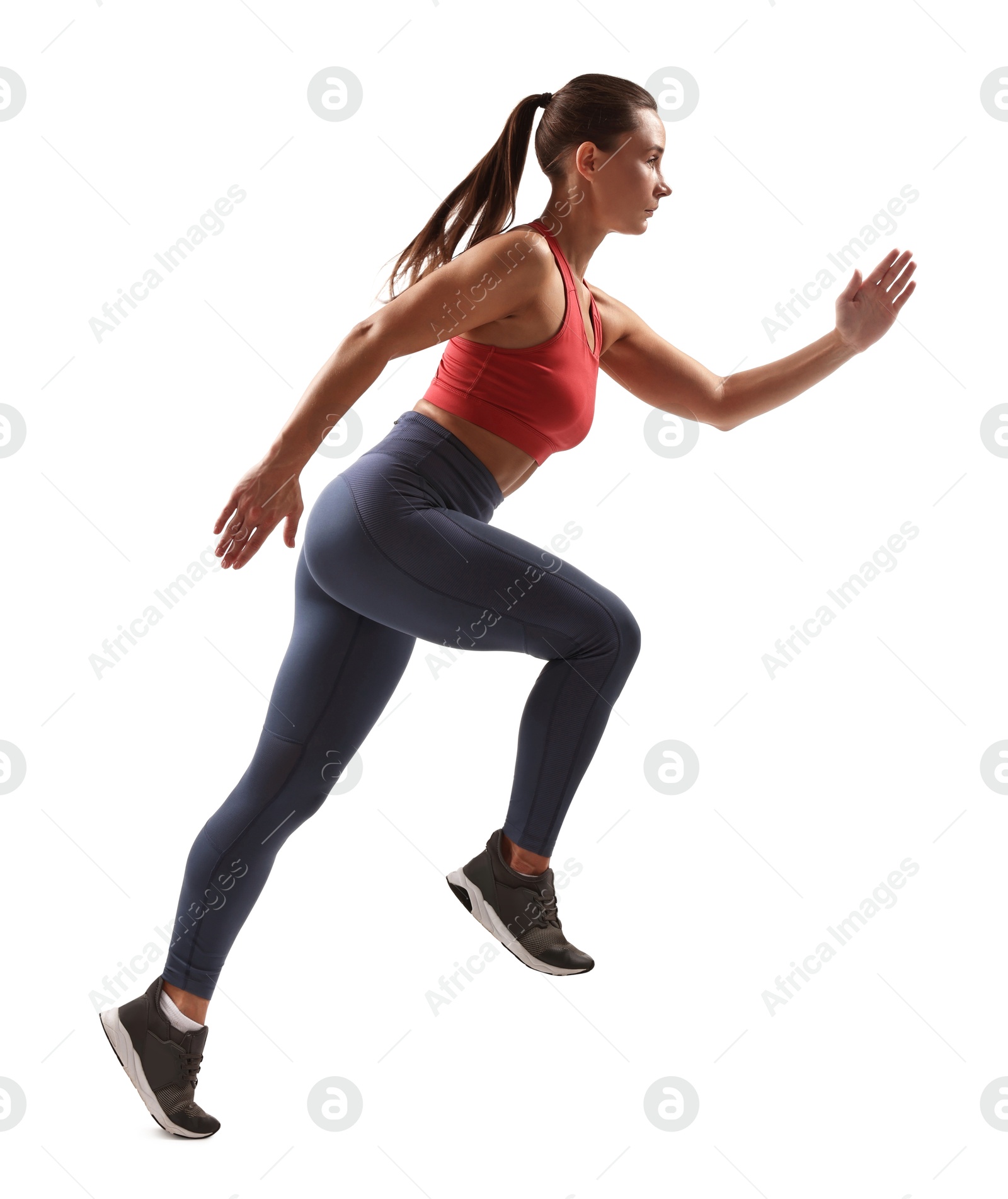 Photo of Woman in sportswear running on white background