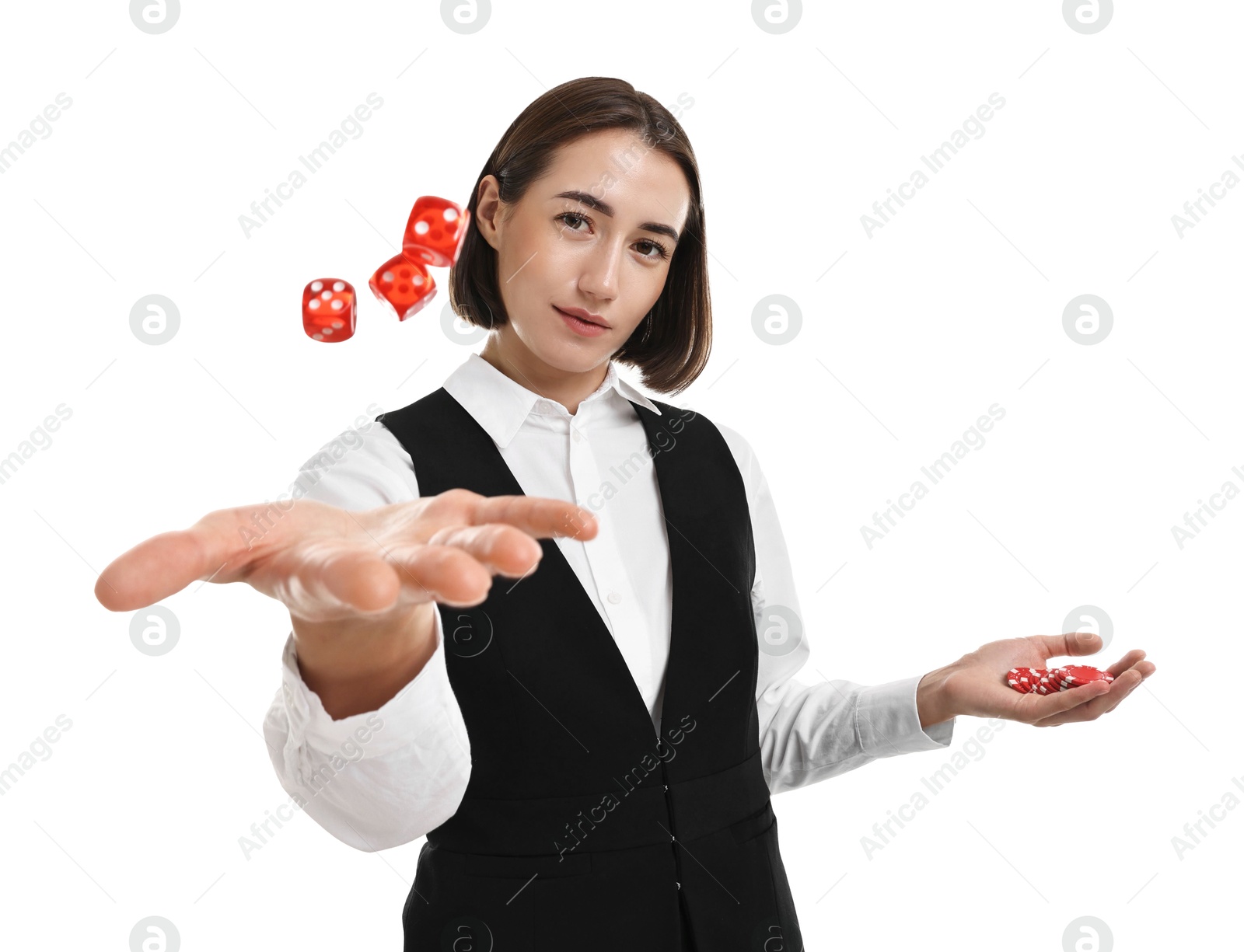 Photo of Professional croupier with dice and casino chips on white background