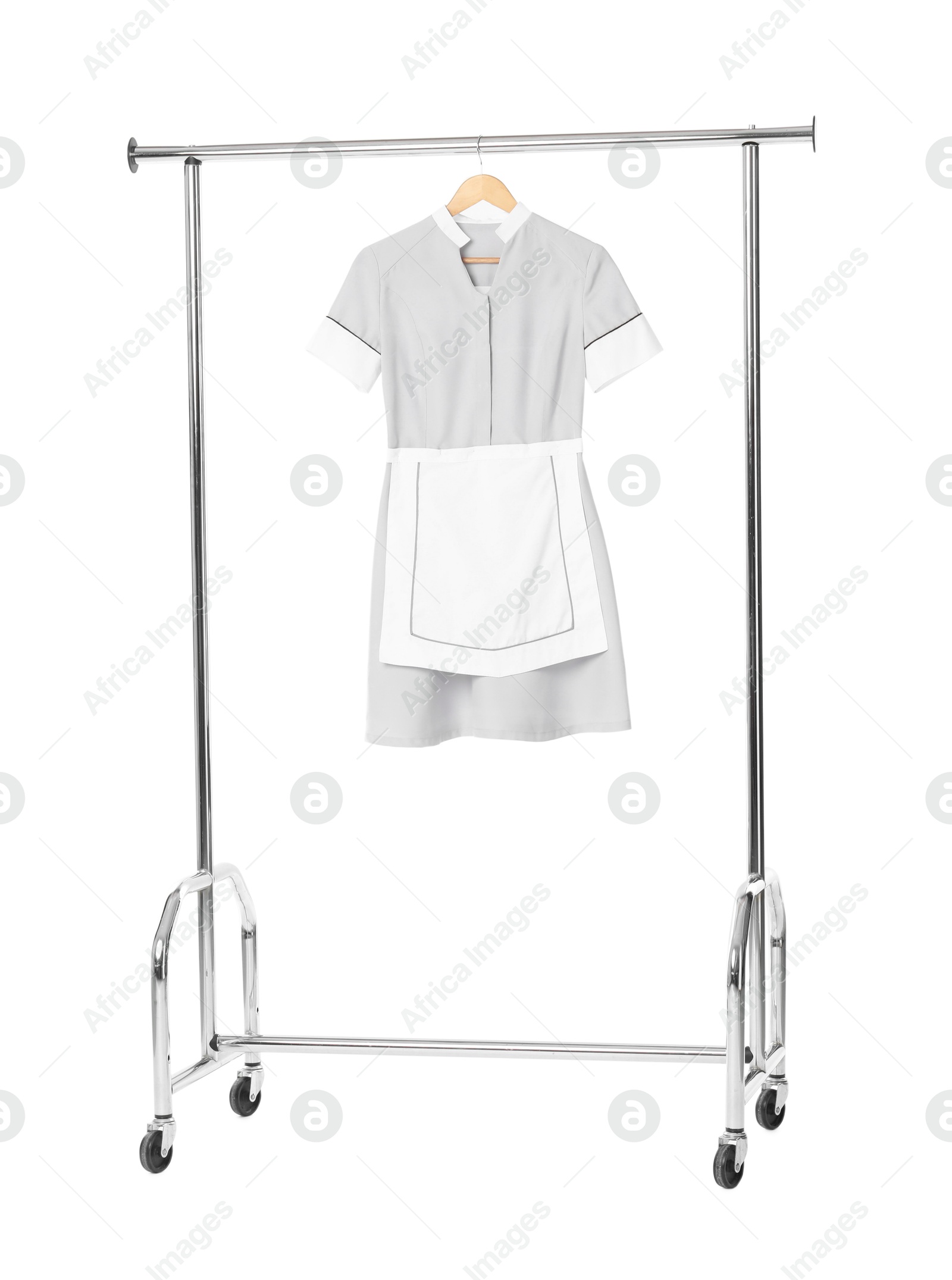 Photo of One maid's uniform on clothing rack isolated on white