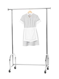 Photo of One maid's uniform on clothing rack isolated on white