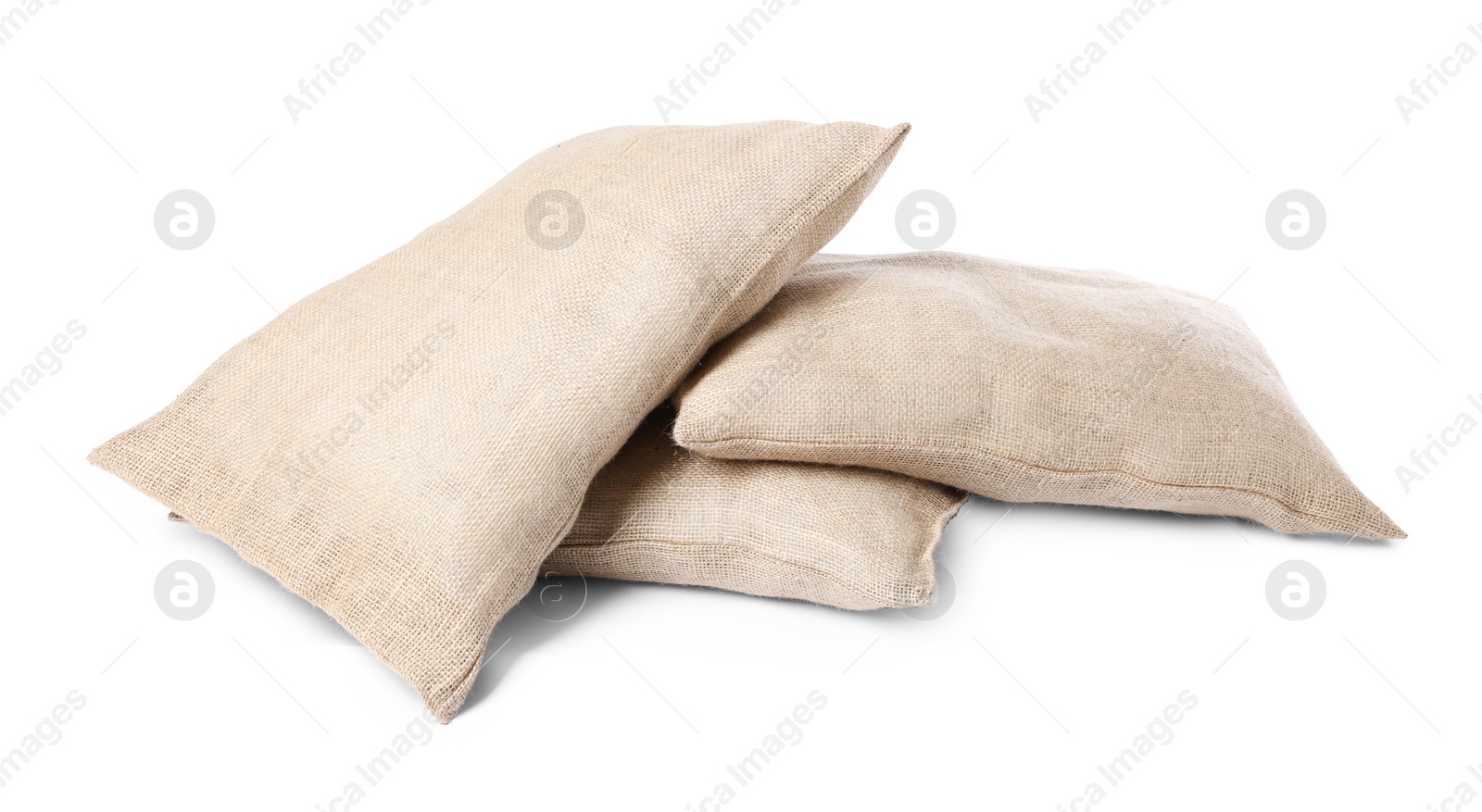 Photo of Group of burlap sacks isolated on white