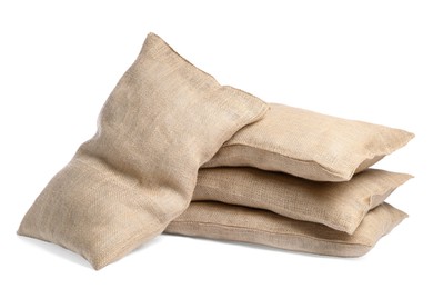 Photo of Group of burlap sacks isolated on white