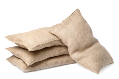 Photo of Group of burlap sacks isolated on white