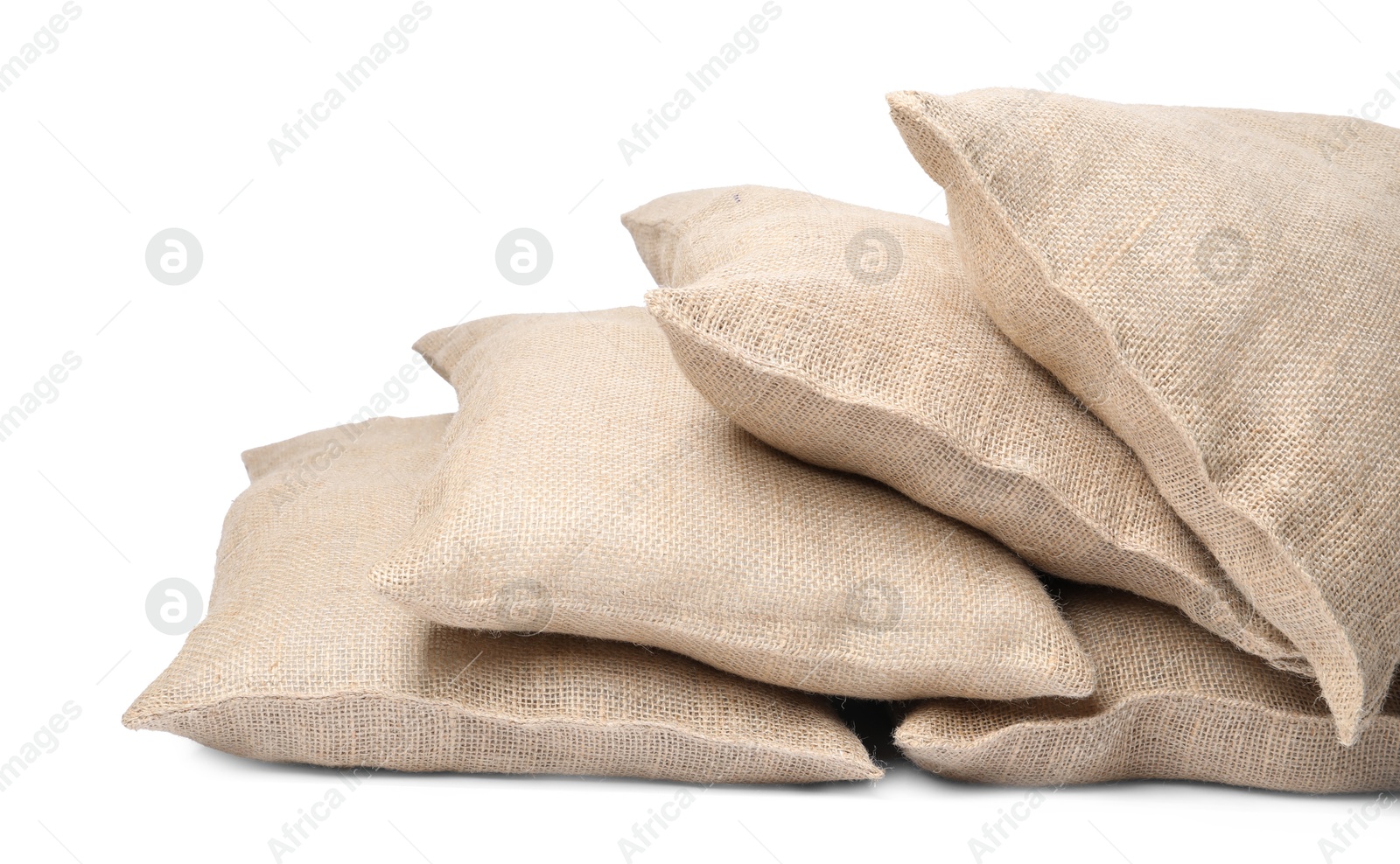 Photo of Group of burlap sacks isolated on white