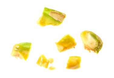 Photo of Pieces of peeled pistachio nut isolated on white