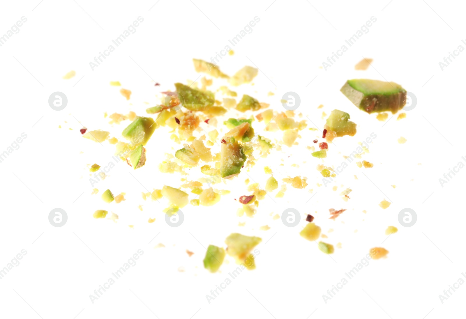 Photo of Pieces of peeled pistachio nut isolated on white