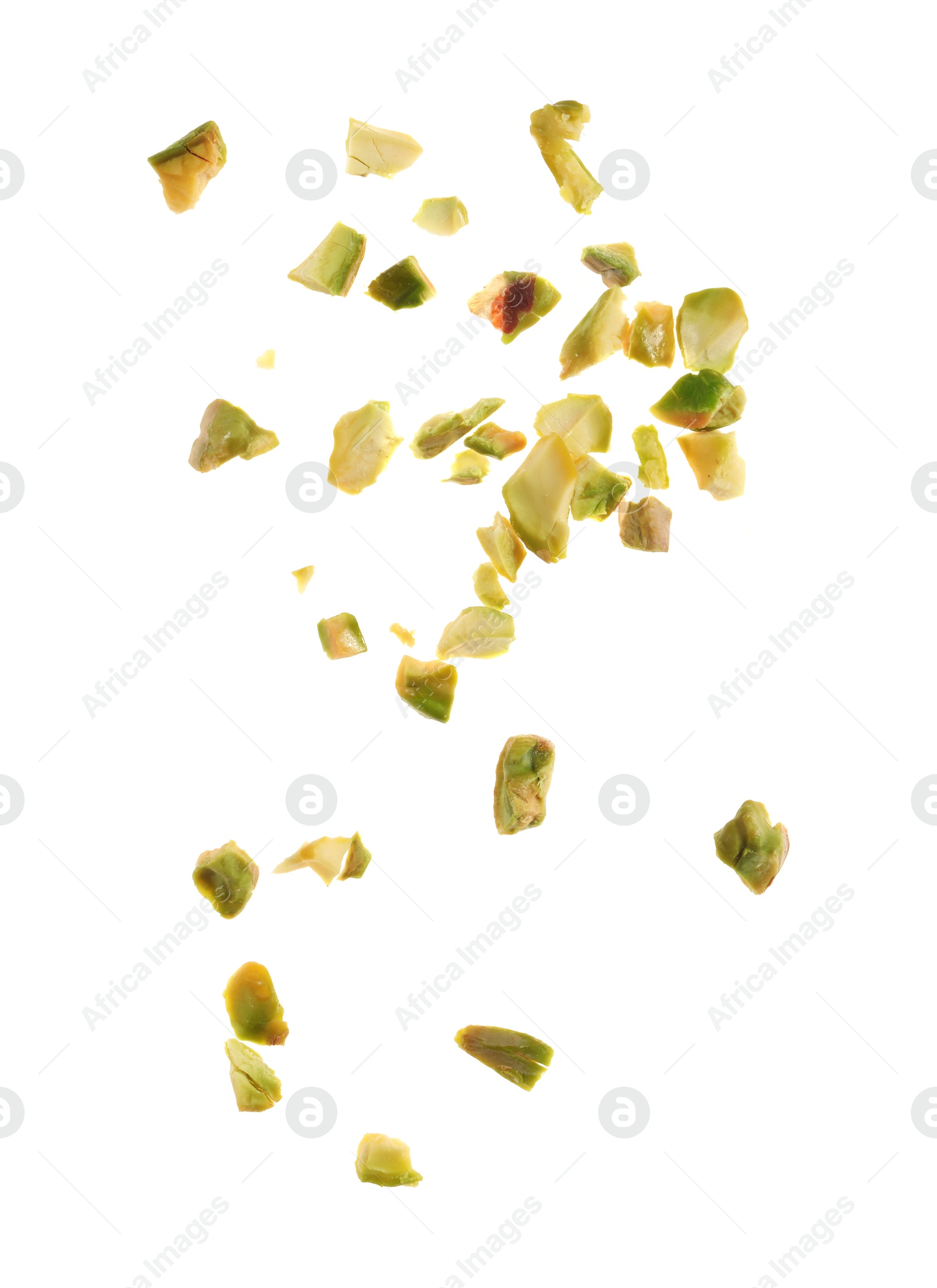 Photo of Pieces of peeled pistachio nut isolated on white