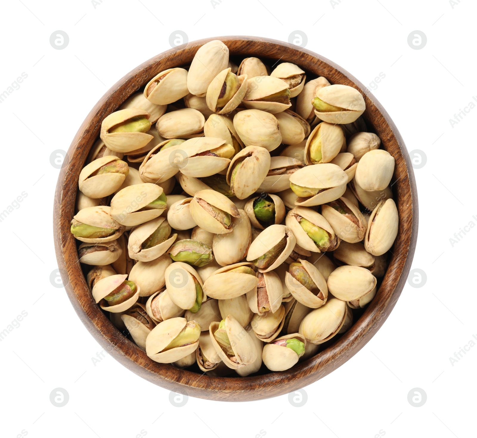 Photo of Tasty pistachio nuts in bowl isolated on white, top view