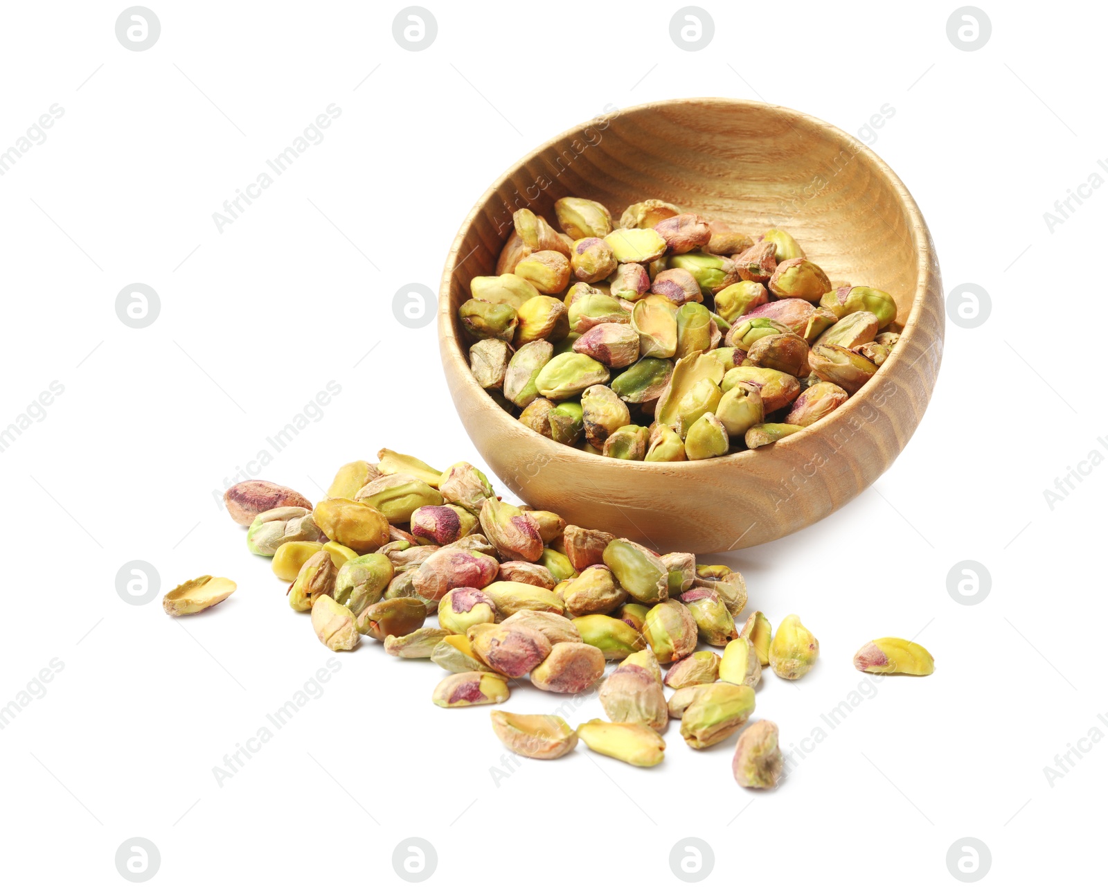 Photo of Peeled pistachio nuts in bowl isolated on white