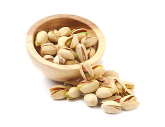 Photo of Tasty pistachio nuts in bowl isolated on white