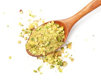 Photo of Pieces of peeled pistachio nut in wooden spoon isolated on white, top view