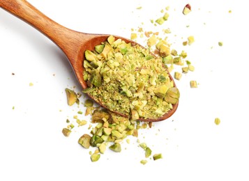 Photo of Pieces of peeled pistachio nut in wooden spoon isolated on white, top view