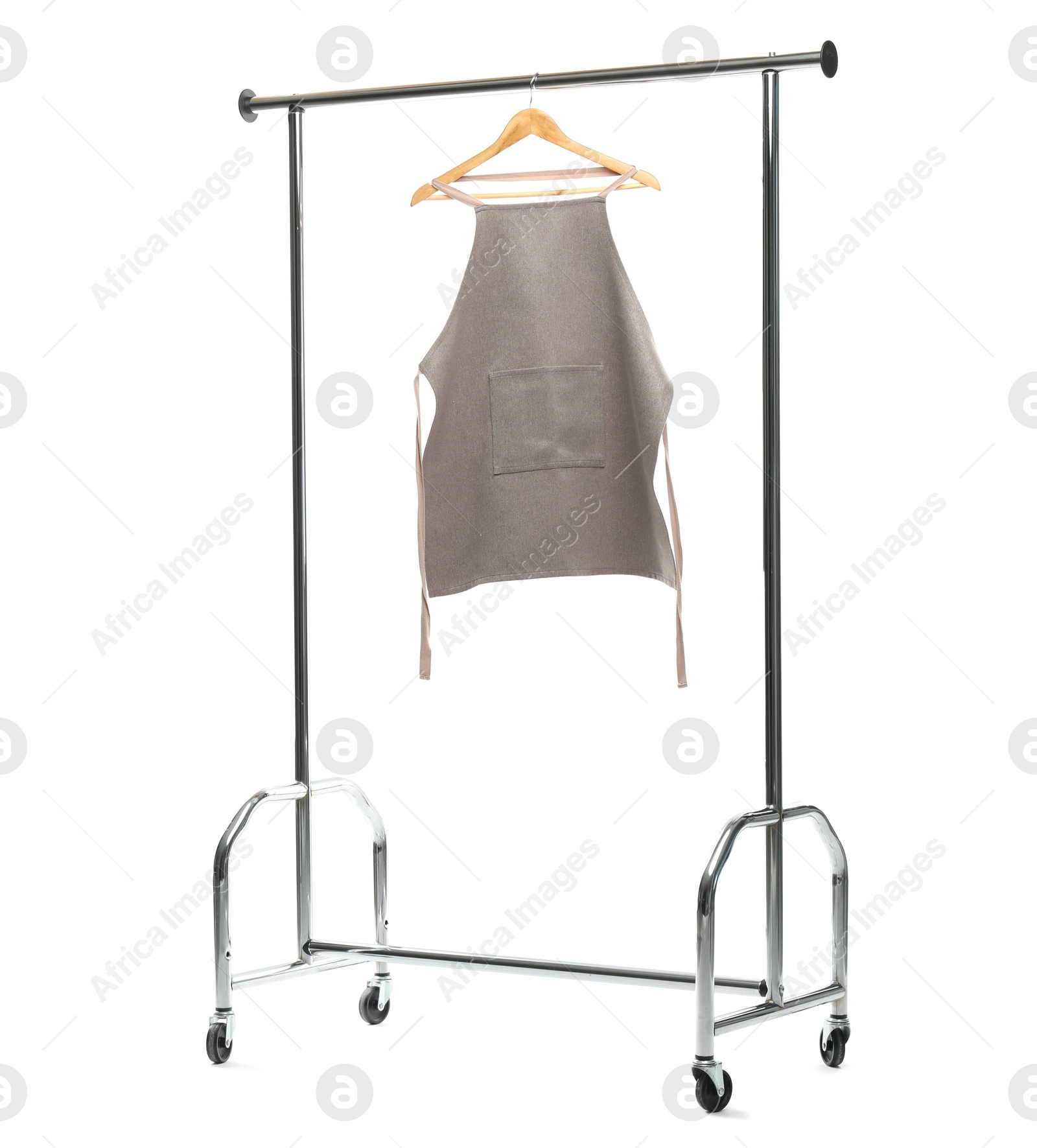 Photo of Chef's apron on clothing rack isolated on white