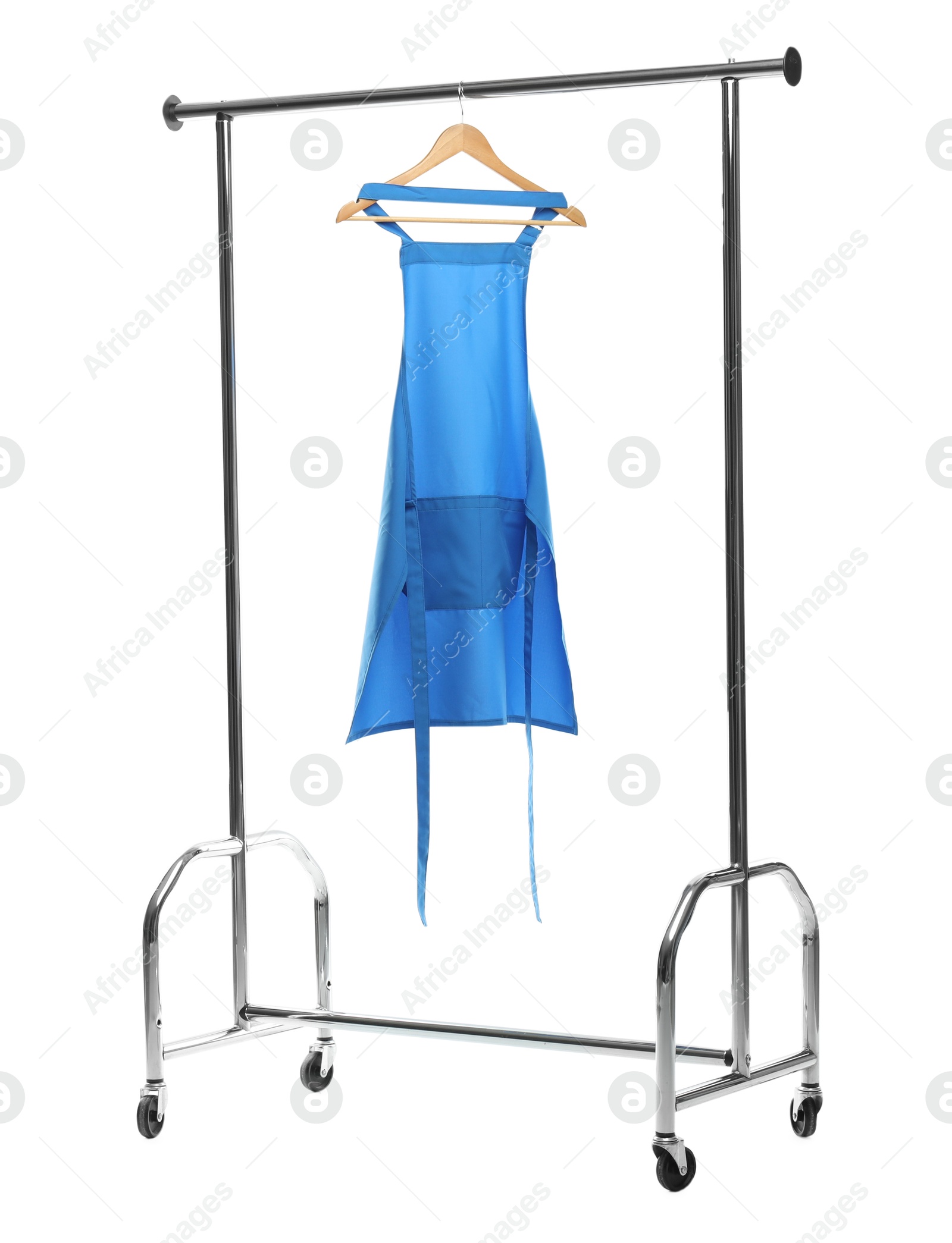 Photo of Chef's apron on clothing rack isolated on white