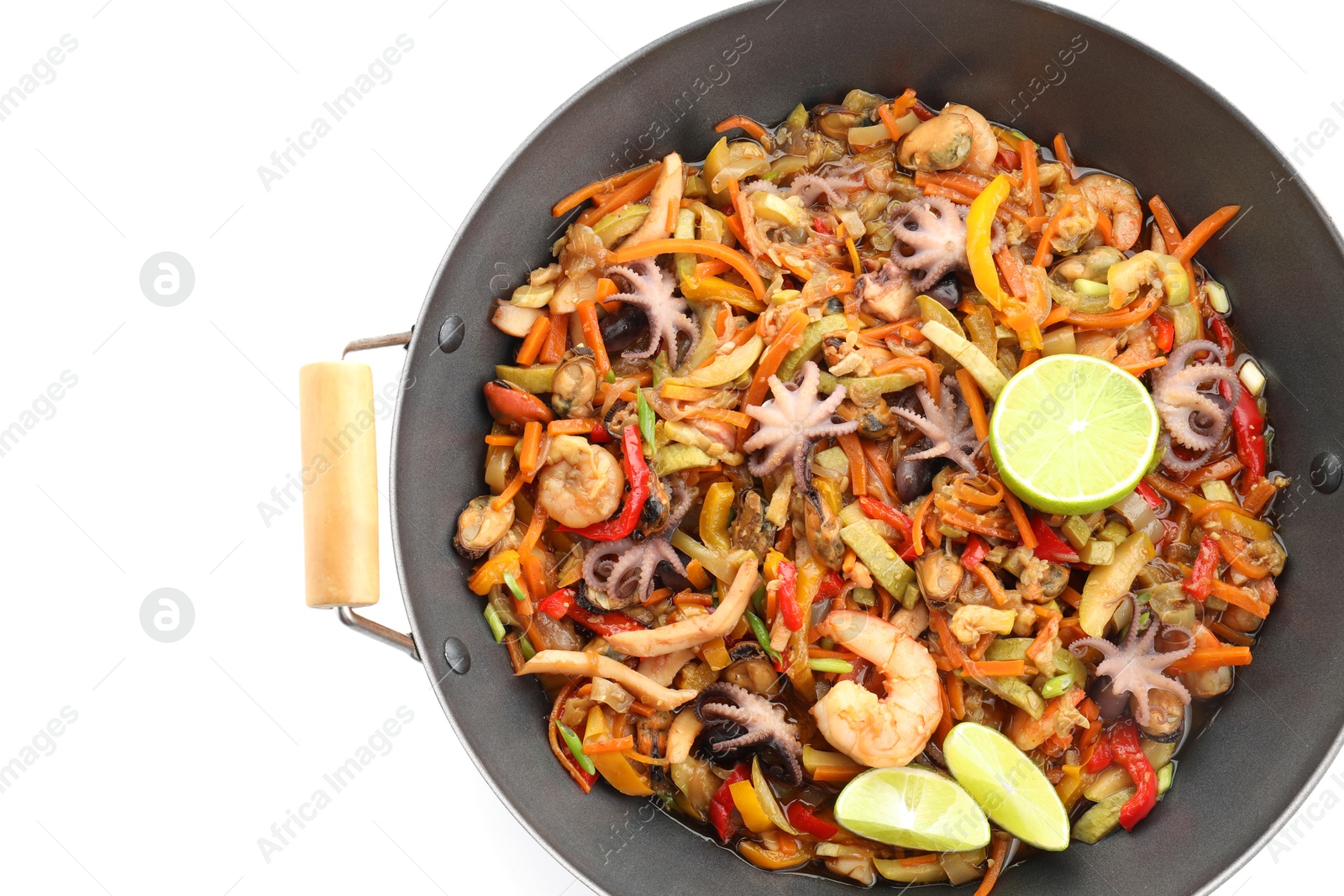 Photo of Stir-fry sea food in wok isolated on white, top view