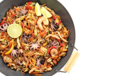 Photo of Stir-fry sea food in wok isolated on white, top view