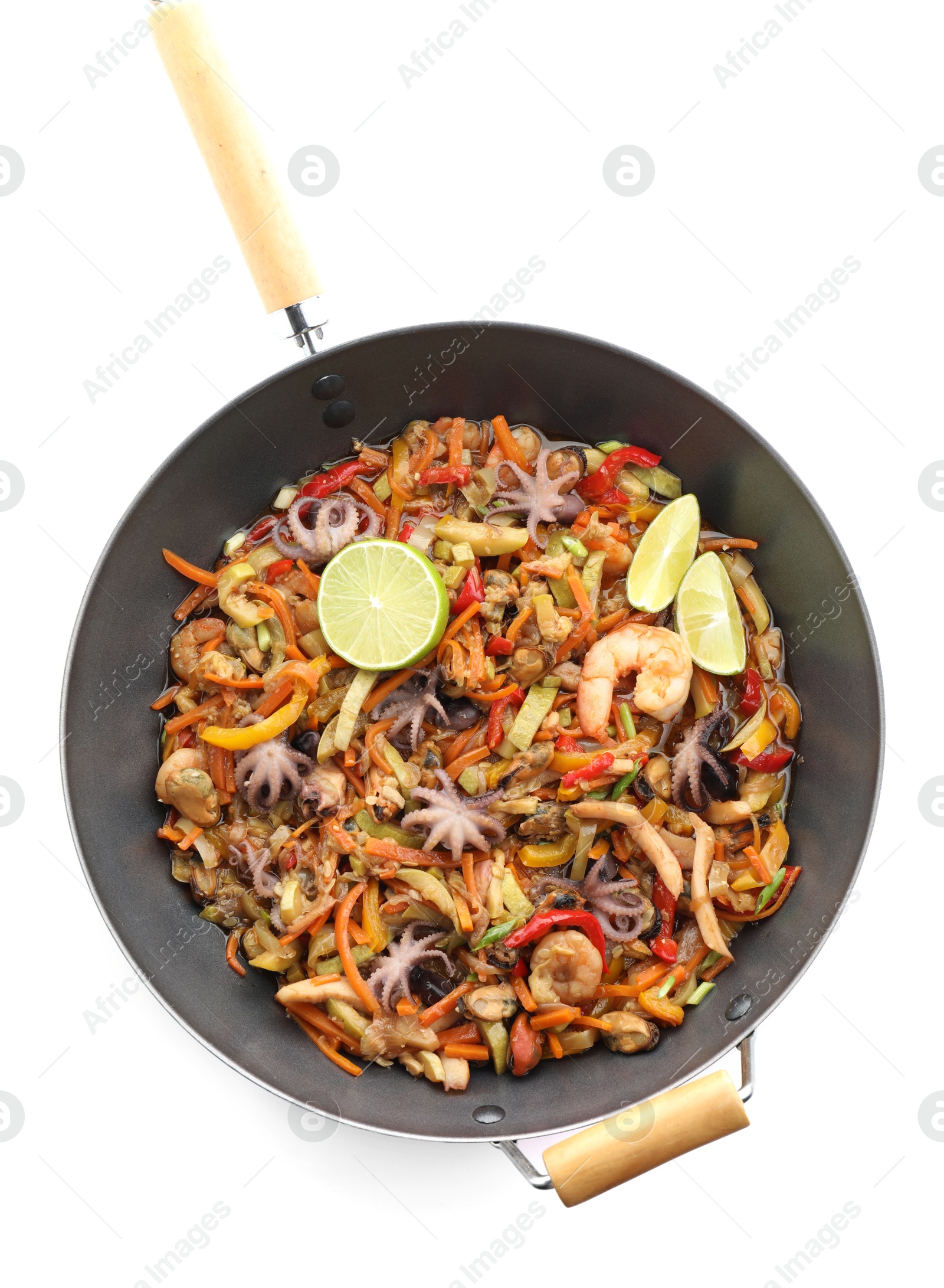 Photo of Stir-fry sea food in wok isolated on white, top view