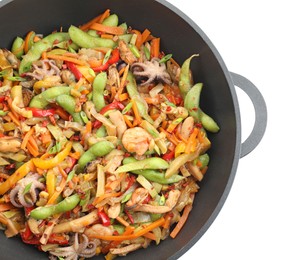 Photo of Stir-fry sea food in wok isolated on white, top view