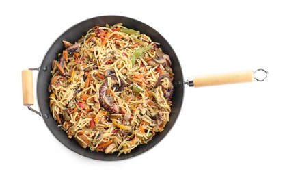 Stir-fry noodles with sea food and vegetables in wok isolated on white, top view