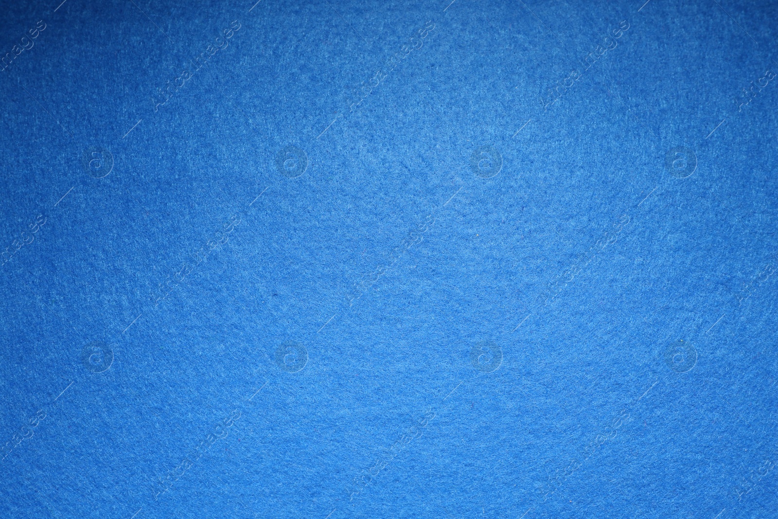 Photo of Blue textured surface as background, top view