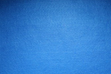 Photo of Blue textured surface as background, top view