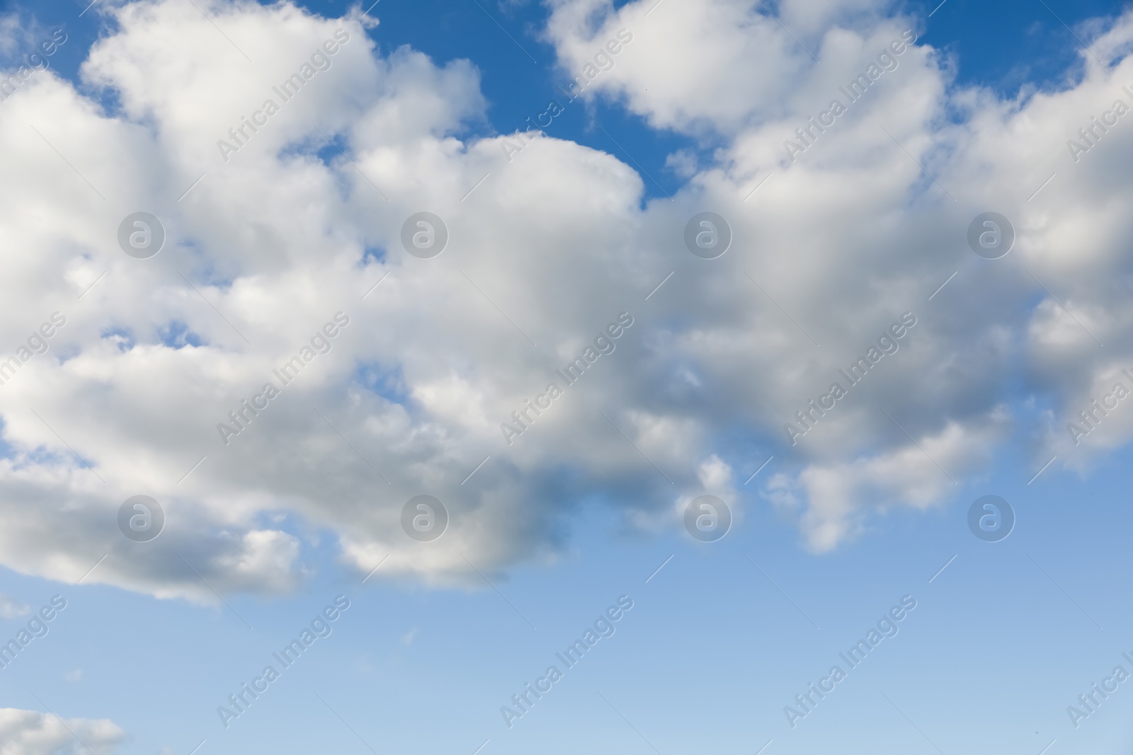 Photo of Picturesque view of blue sky with fluffy clouds