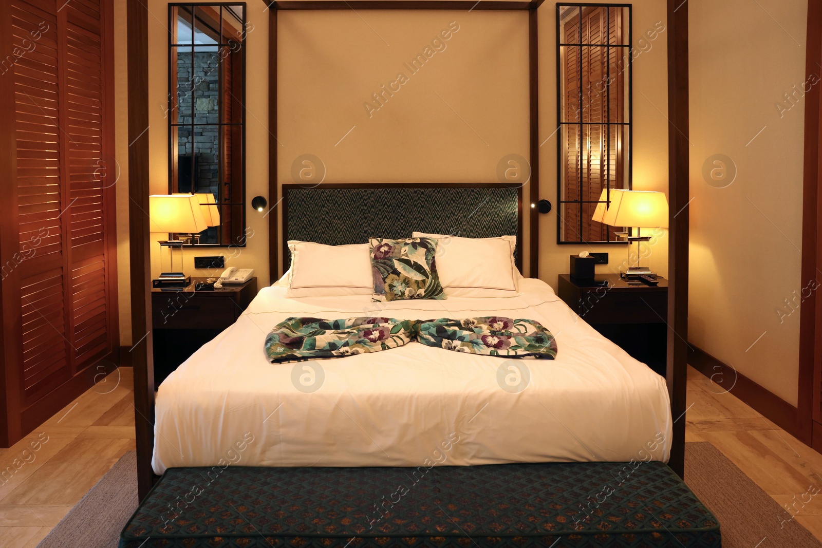 Photo of Comfortable large bed in stylish hotel room