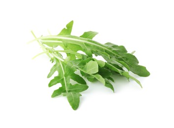 Photo of Many fresh arugula leaves on white background