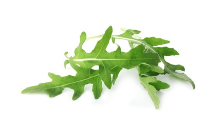 Photo of Many fresh arugula leaves isolated on white