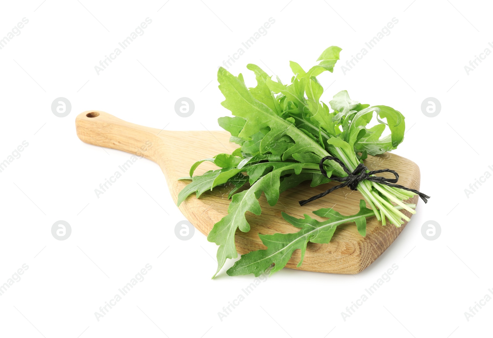 Photo of Bunch of fresh arugula leaves and board isolated on white