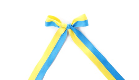 Photo of Ribbon with bow in colors of Ukrainian national flag isolated on white