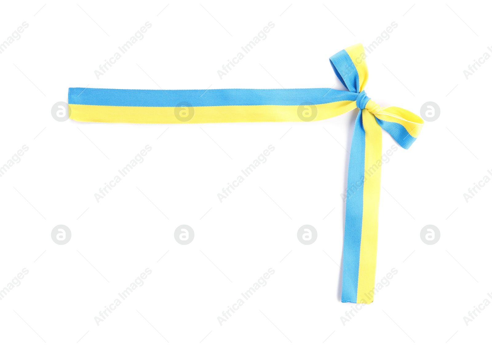 Photo of Ribbon with bow in colors of Ukrainian national flag isolated on white, top view