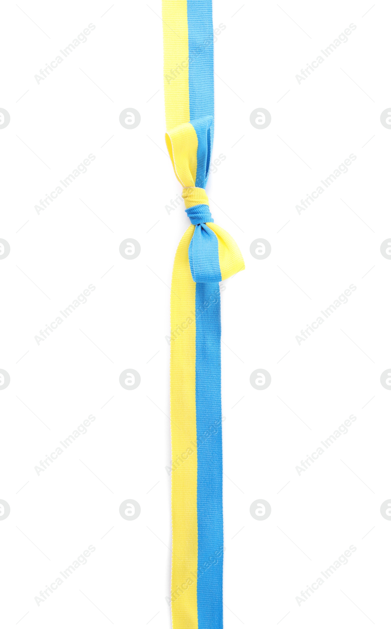 Photo of Ribbon with bow in colors of Ukrainian national flag isolated on white, top view