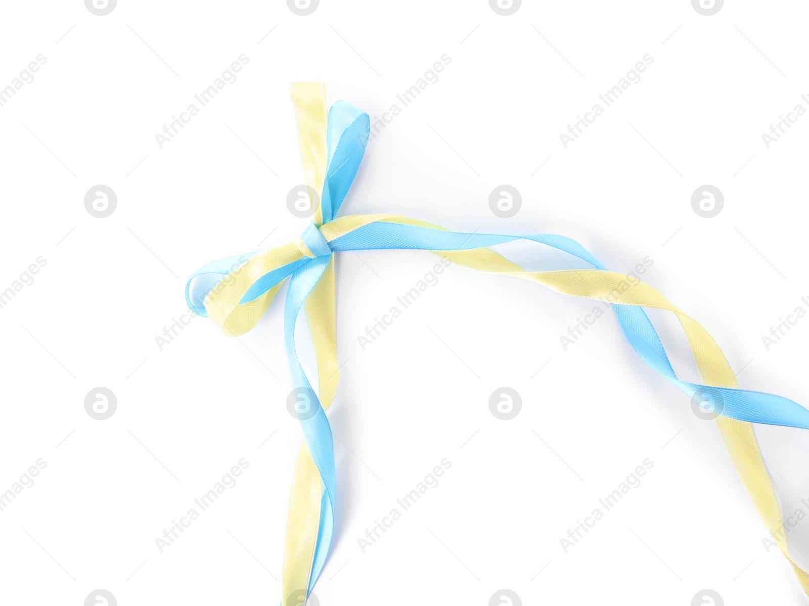 Photo of Bow in colors of Ukrainian national flag isolated on white, top view