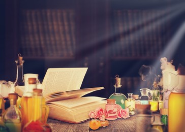 Image of Chemist's workplace with old book and laboratory glassware, vintage style