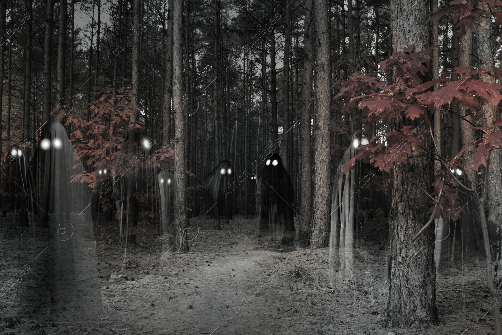 Image of Creepy ghosts with glowing eyes among trees in forest