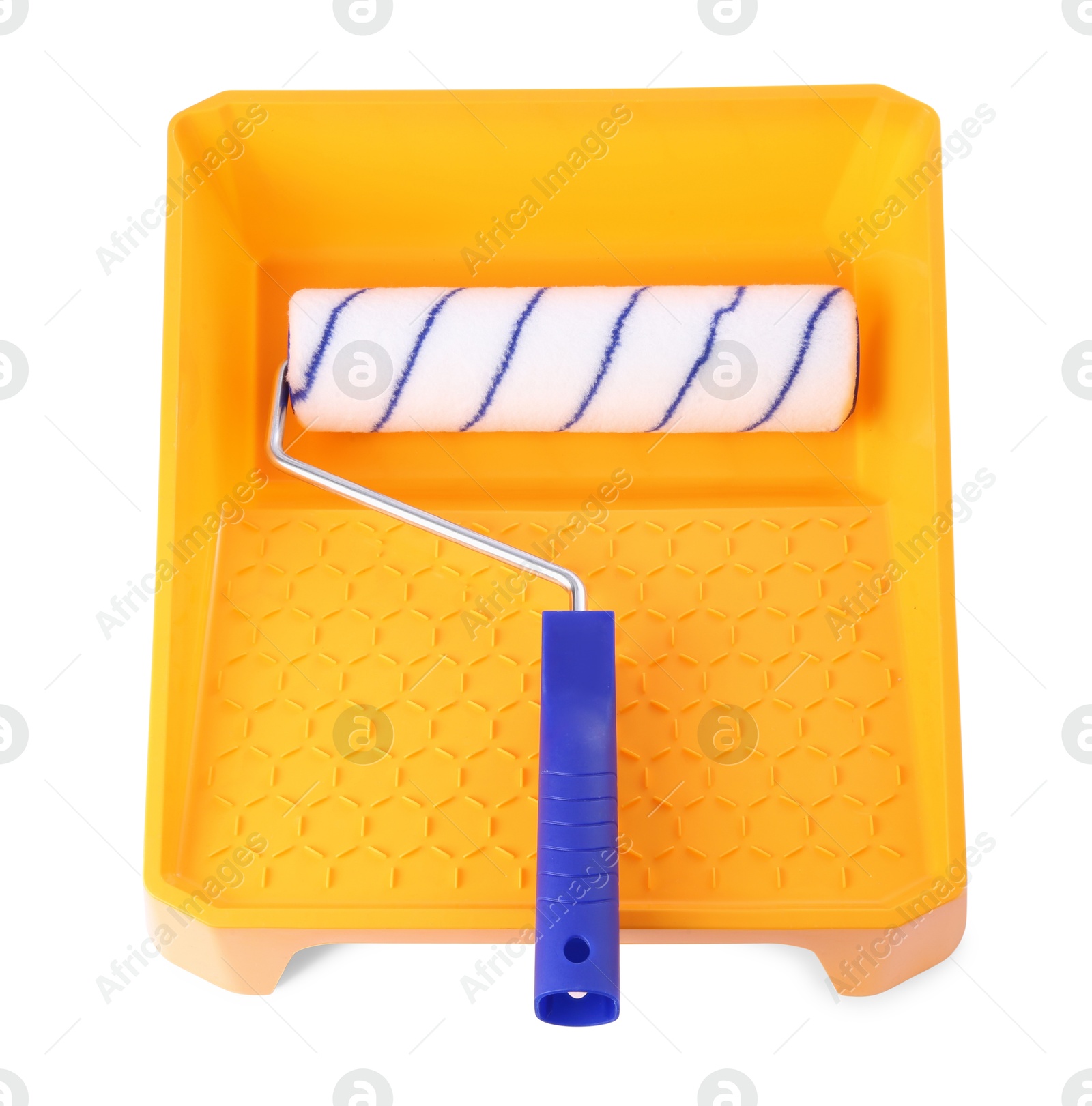 Photo of Paint roller brush and yellow plastic tray isolated on white, above view. Construction tool