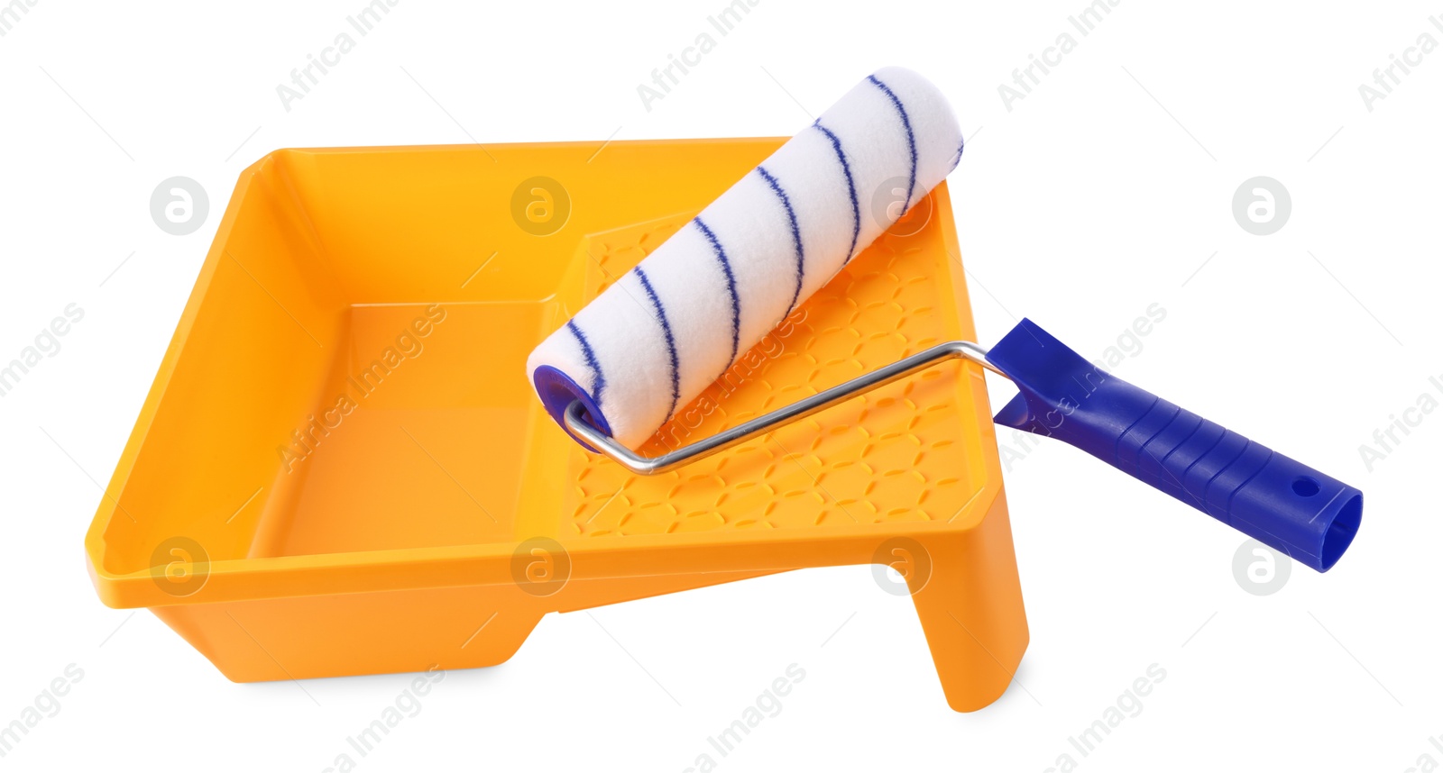 Photo of Paint roller brush and yellow plastic tray isolated on white. Construction tool