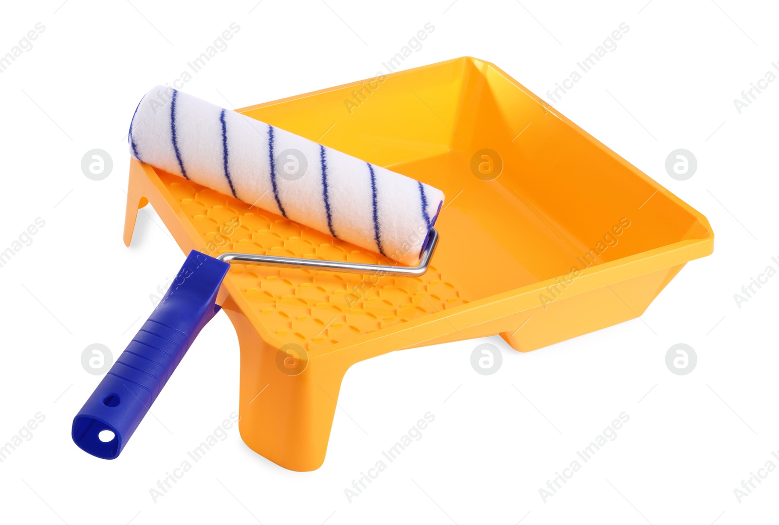 Photo of Paint roller brush and yellow plastic tray isolated on white. Construction tool