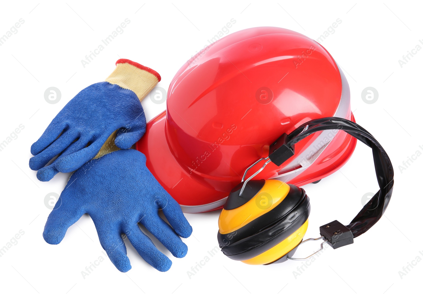 Photo of Orange hard hat, gloves and earmuffs isolated on white. Safety equipment