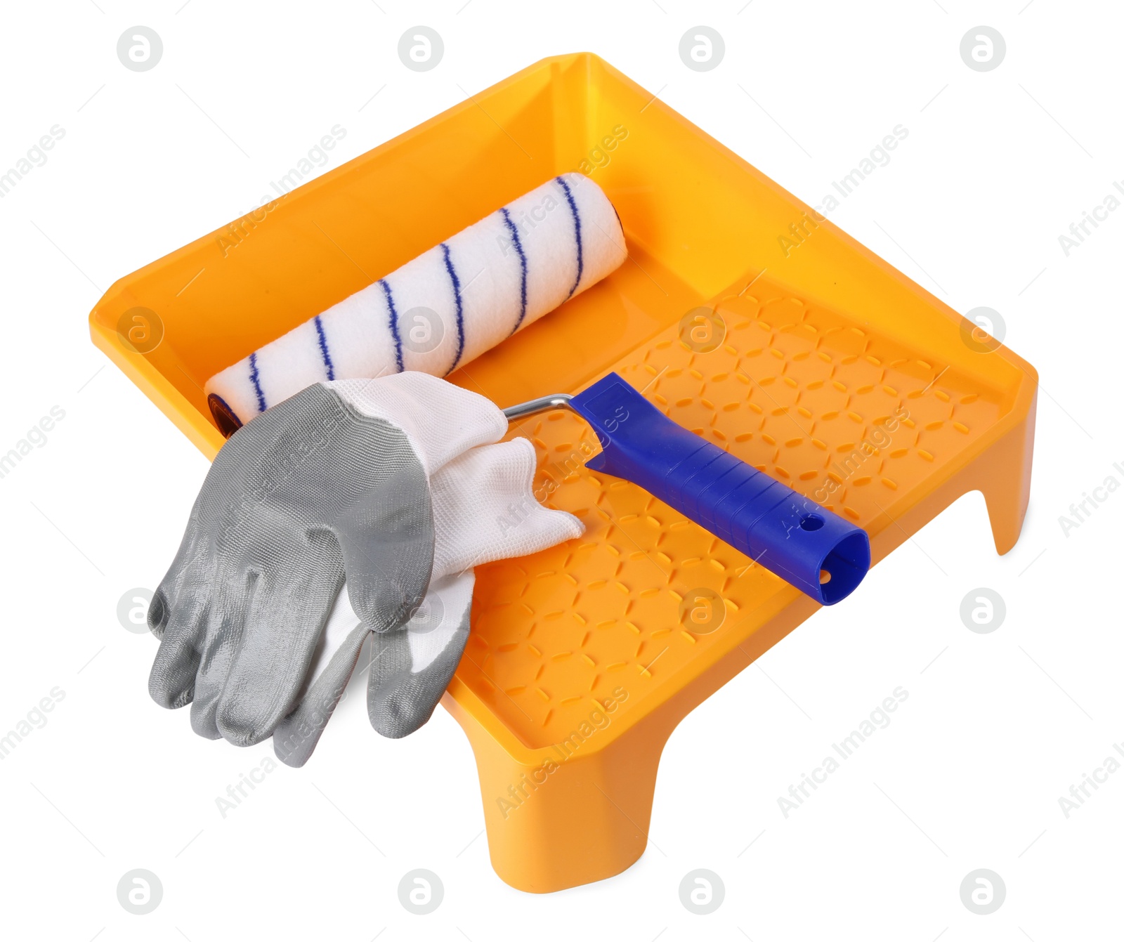 Photo of Paint roller brush, tray and gloves isolated on white