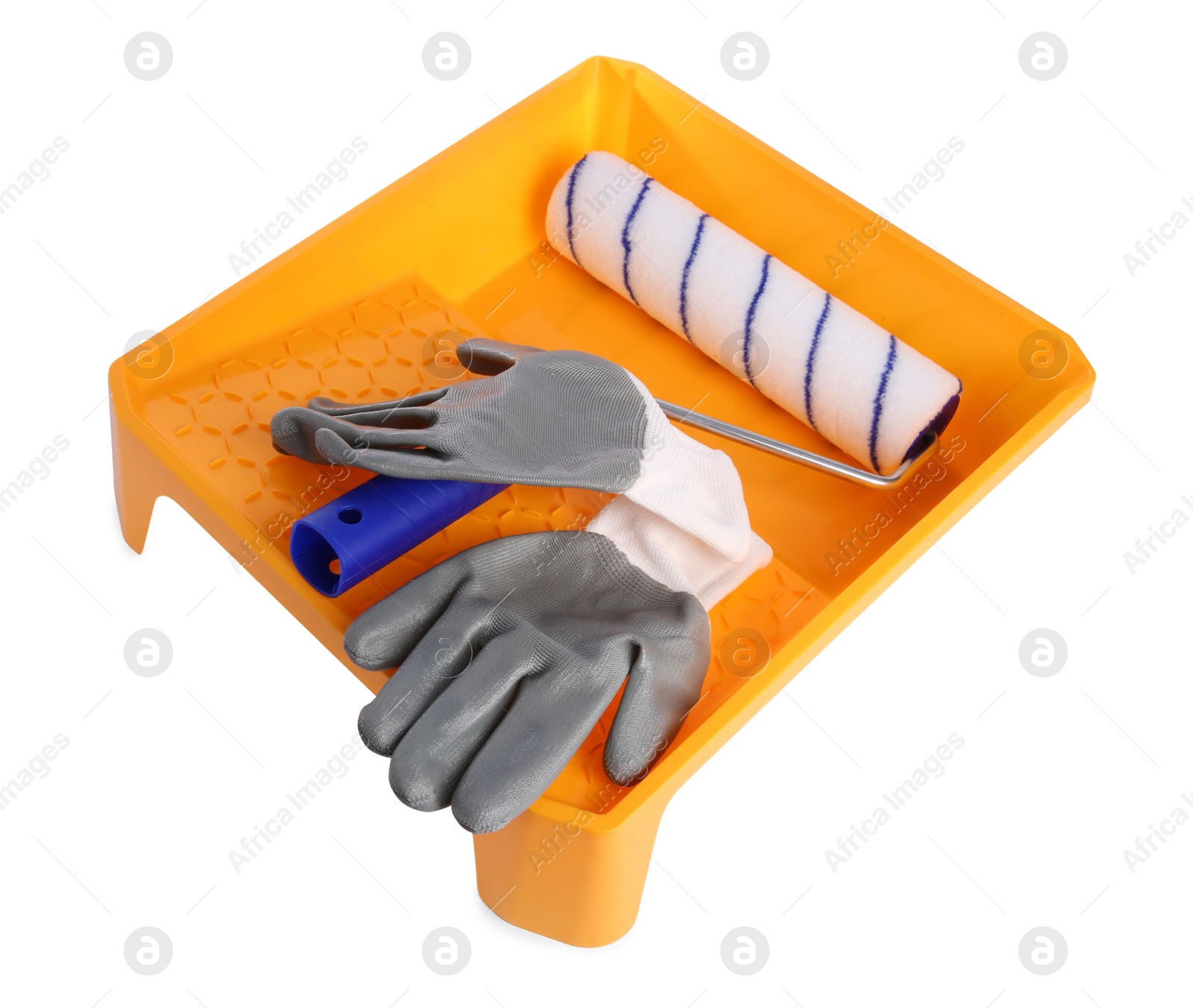 Photo of Paint roller brush, tray and gloves isolated on white