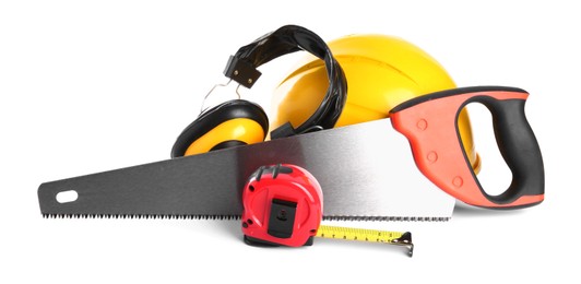 Photo of Saw, hard hat, measuring tape and earmuffs isolated on white. Construction tools