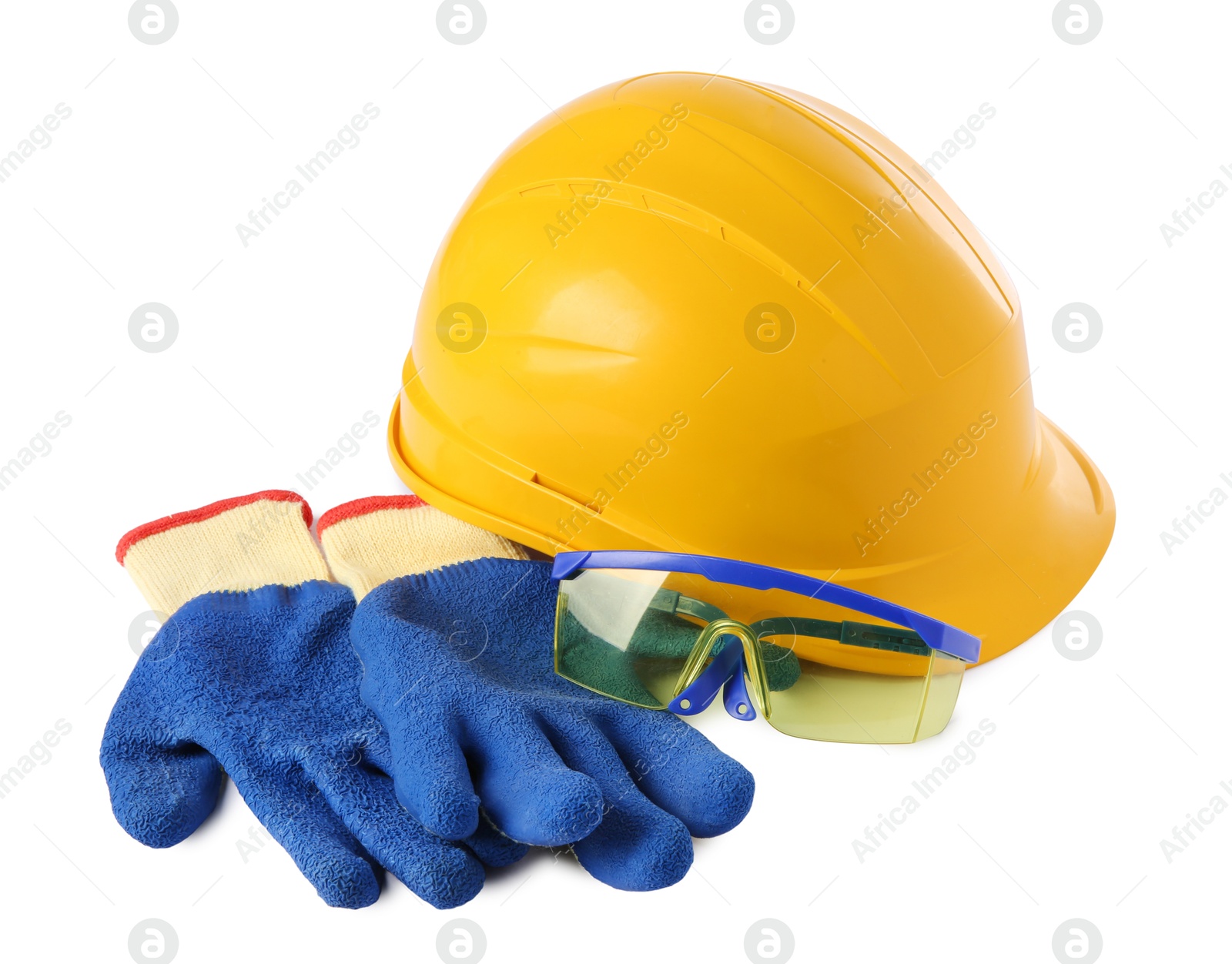 Photo of Yellow hard hat, gloves and goggles isolated on white. Safety equipment