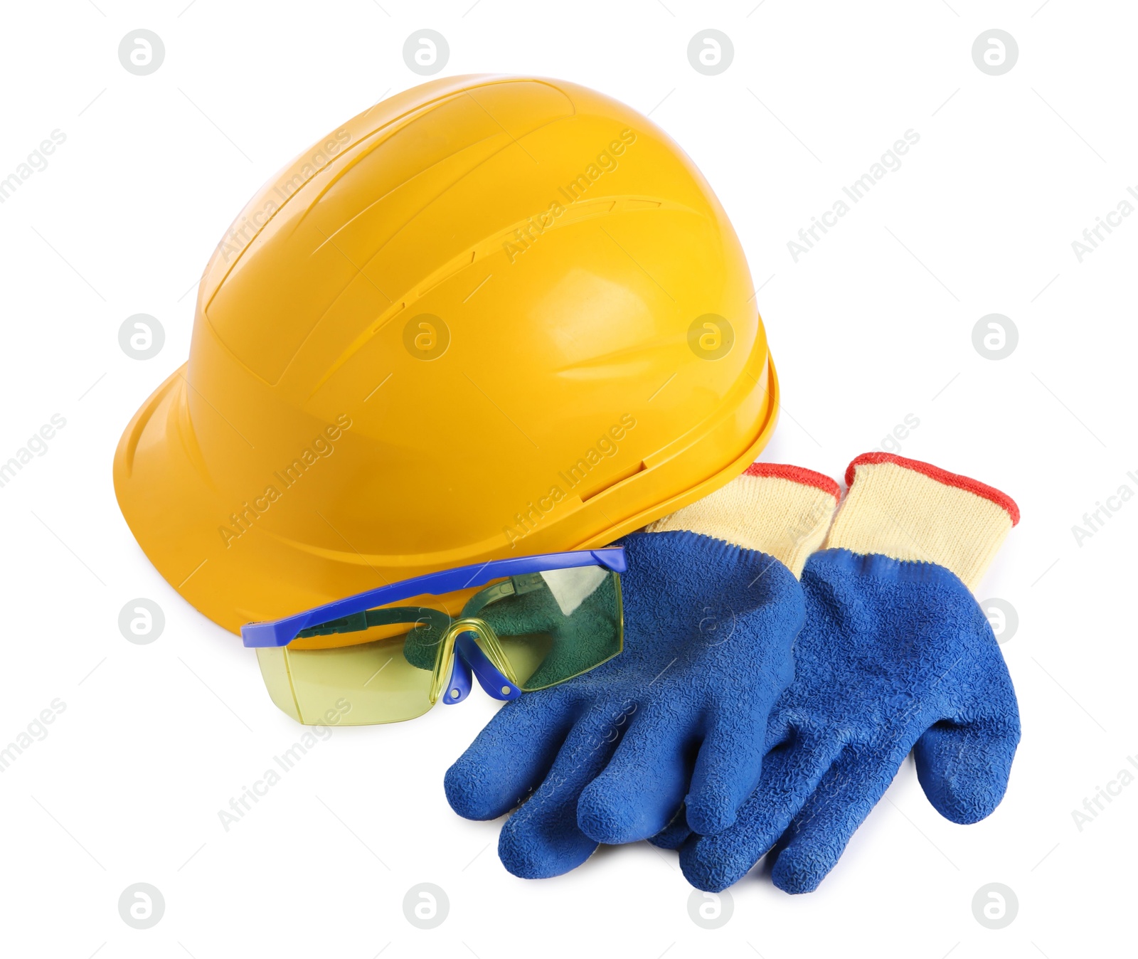 Photo of Yellow hard hat, gloves and goggles isolated on white. Safety equipment