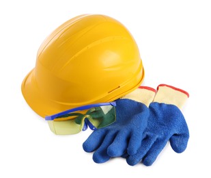 Photo of Yellow hard hat, gloves and goggles isolated on white. Safety equipment