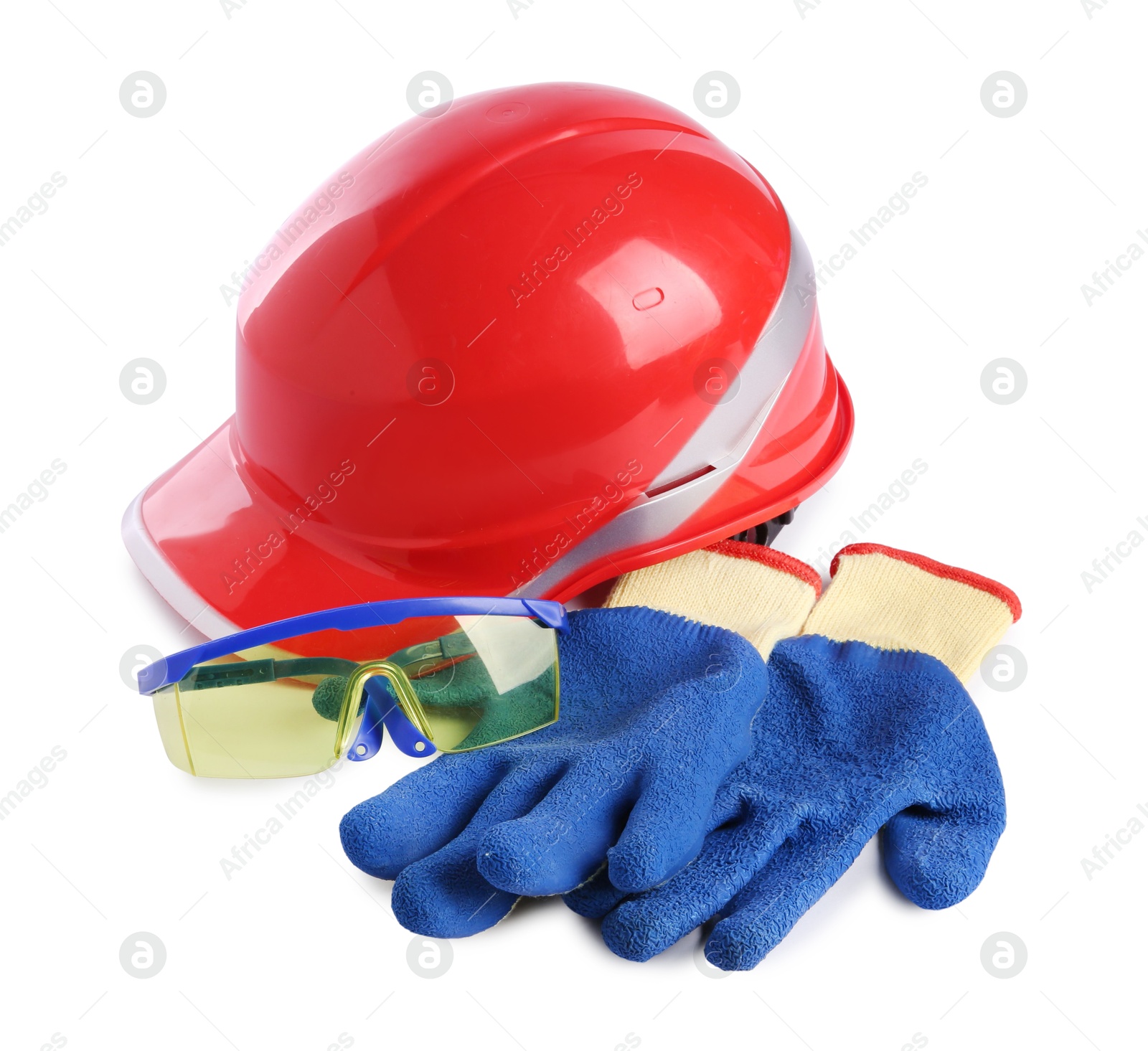 Photo of Orange hard hat, gloves and goggles isolated on white. Safety equipment