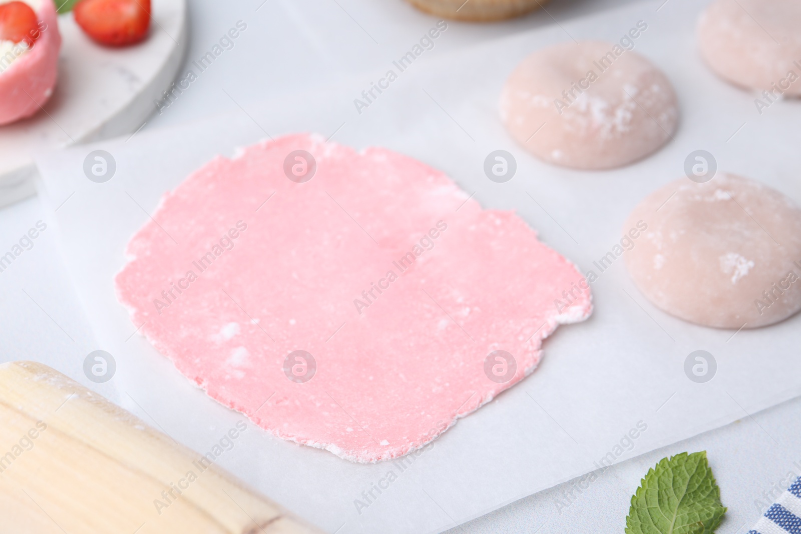 Photo of Dough for tasty homemade mochi on table, closeup