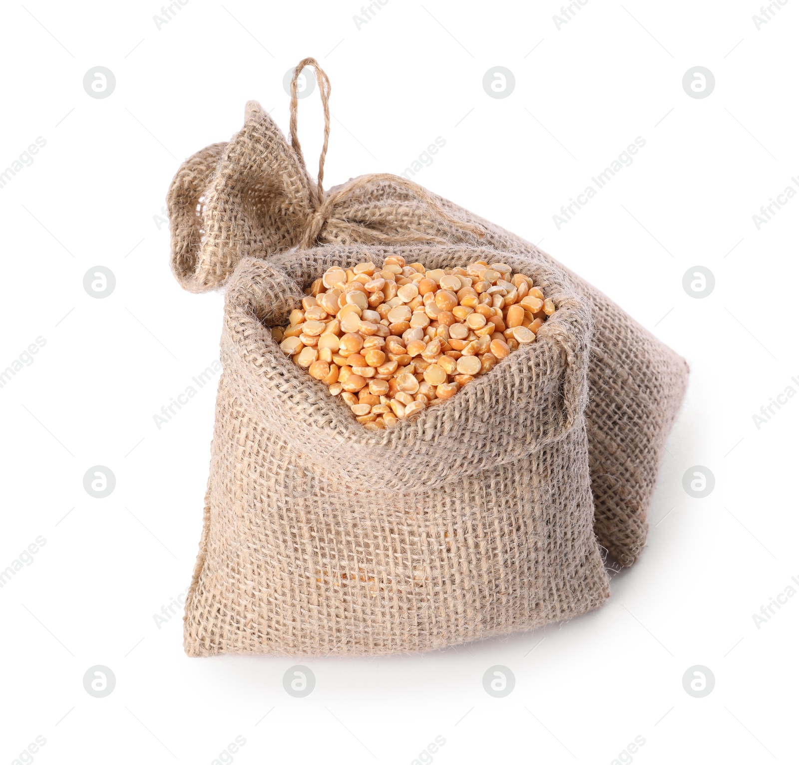 Photo of Burlap sacks with dried peas isolated on white