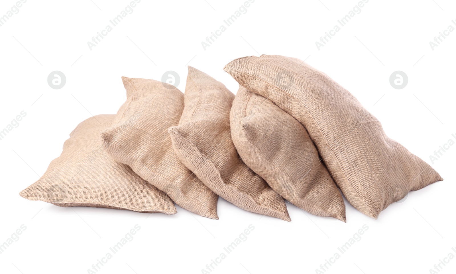 Photo of Group of burlap sacks isolated on white